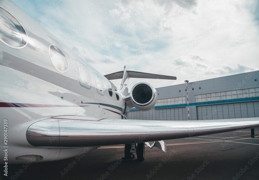 modern and comfortable business jet plane in the afternoon at the airport modern and comfortable business jet plane in the afternoon at the airport