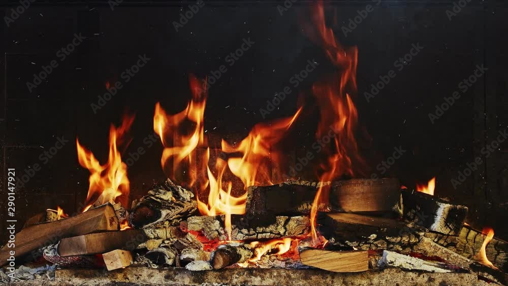 Burning Fireplace. This video captures a stationary shot of a burning fireplace. Burning Fireplace. This video captures a stationary shot of a burning fireplace.