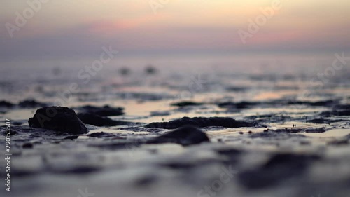 closeup of sand at ebb, low water level, at the wattenmeer in germany, at evening photo