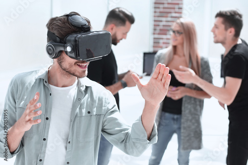 Young men with virtual reality goggles