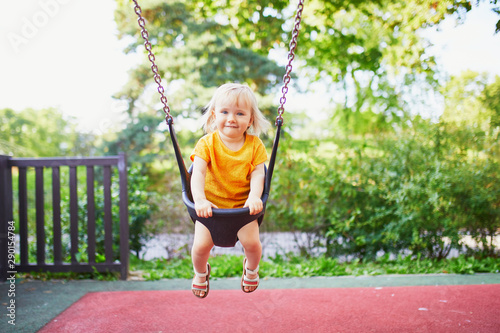 Happy little kid on a swing © Ekaterina Pokrovsky