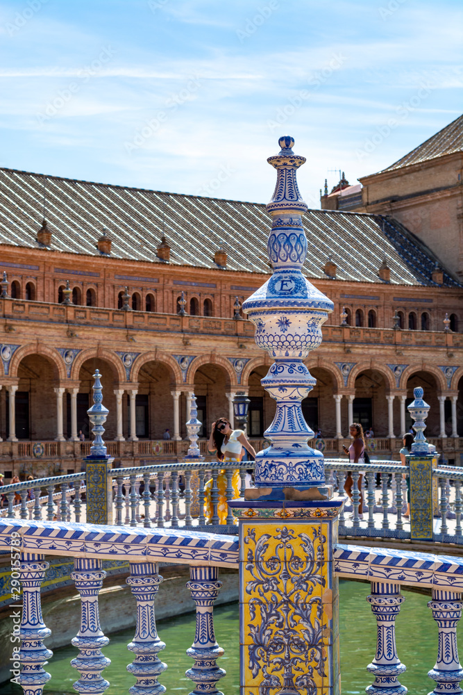 Decoration details of Place of Spain in Seville, traditional Andalucian tails on bridge