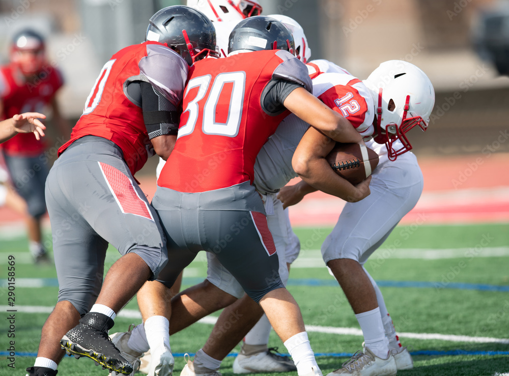 Great action photos of high school football players making amazing plays during a football game Great action photos of high school football players making amazing plays during a football game