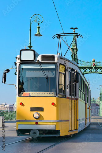 Historic tram on Freedom Bridge in Budapest