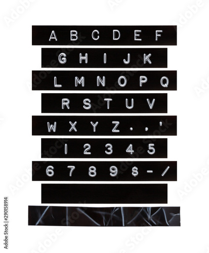 punch letter alphabet on black labeling tape scratches and marks left  untouched on purpose for genuine vintage texture effect Stock Photo - Alamy
