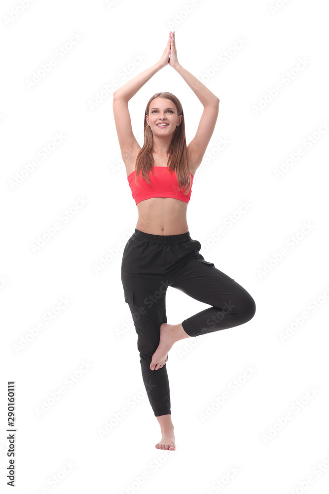 in full growth. charming girl performing fitness exercises in full growth. charming girl performing fitness exercises