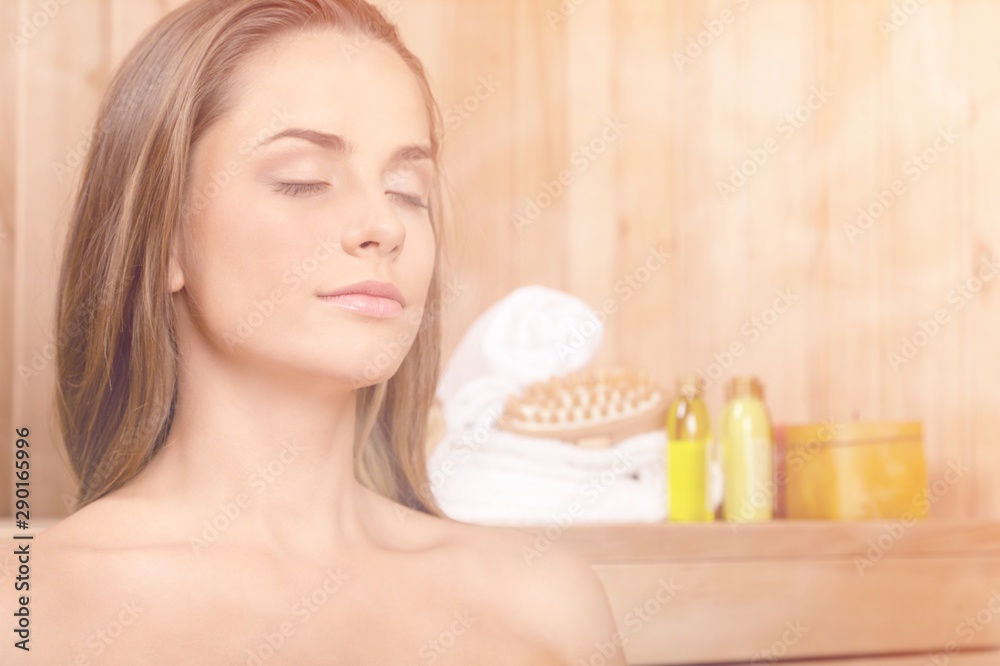 Young beautiful relaxed woman in sauna Young beautiful relaxed woman in sauna