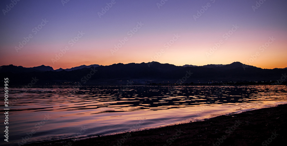 Naklejka premium sunset on beach