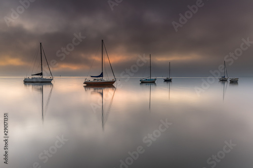 Misty Morning Sunrise Waterscape photo