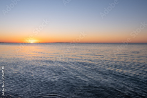 Minimalistic sunset over sea with copy space