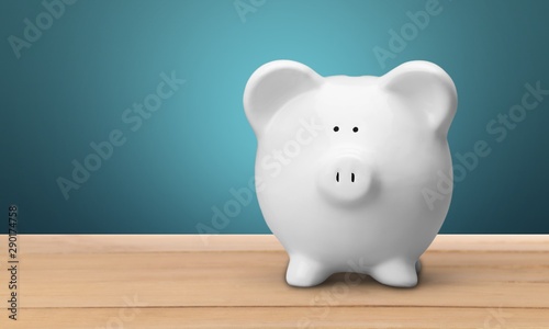 Piggy bank and money on background