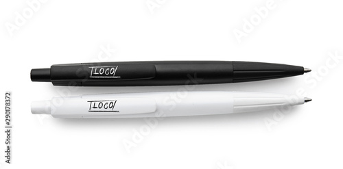 Stylish pens on white background photo