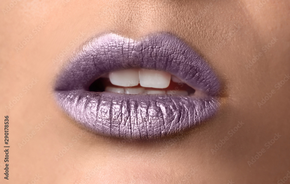 Fototapeta premium Beautiful woman with purple lips, closeup