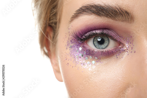 Fototapeta Naklejka Na Ścianę i Meble -  Young woman with beautiful makeup, closeup
