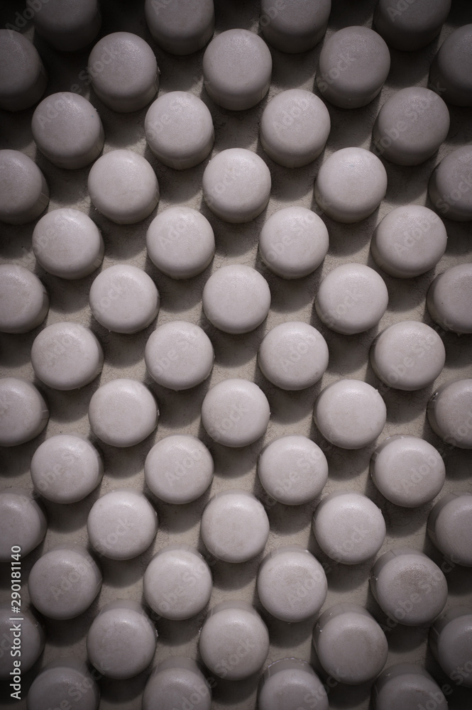 abstract texture of rods with white circle heads texture with vignette. design, background. abstract texture of rods with white circle heads texture with vignette. design, background.