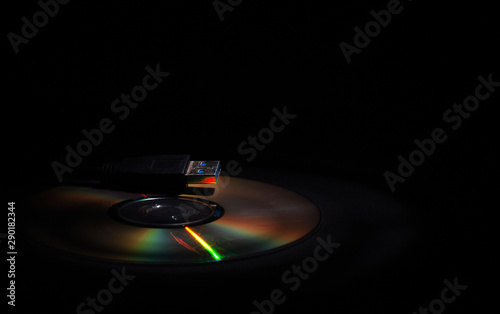 storage of information cd-disc and usb input on dark background