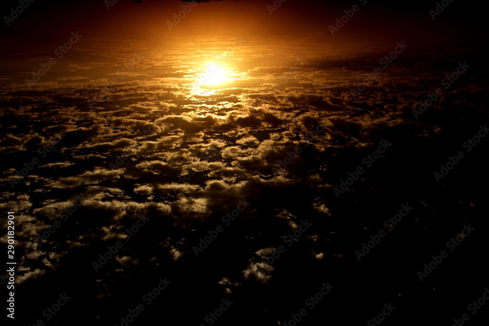 sunset over the clouds