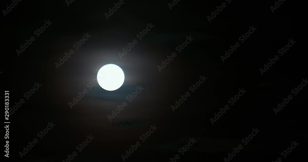Stock time lapse 4k: Full moon rise in dark nature sky, night time. Full moon disk time lapse with moon light up in night dark black sky. High-quality free video footage or timelapse of the moonrise Stock time lapse 4k: Full moon rise in dark nature sky, night time. Full moon disk time lapse with moon light up in night dark black sky. High-quality free video footage or timelapse of the moonrise