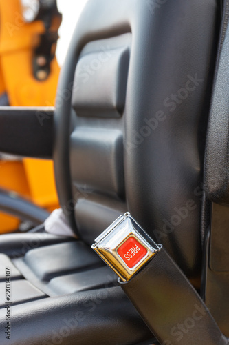 Seat belt in car or industrial machinery. Close seat belt before driving concept