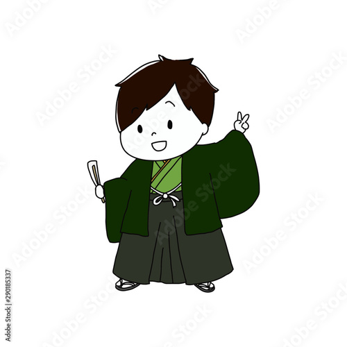 着物を着てピースサインをする男の子
