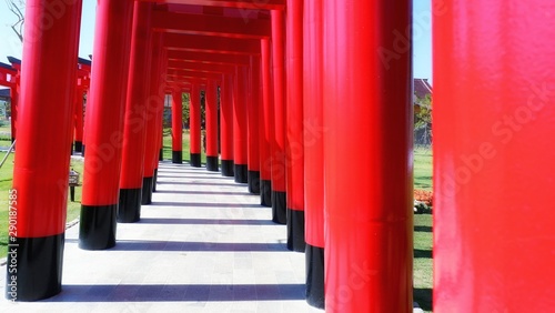 Walkway with red wooden poles Japanese style