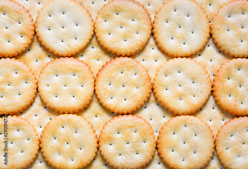 top view stack of round cheese cracker cookies with sugar texture for background