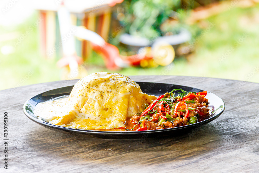 Creamy Omelet with hot and spicy beef panang curry on jusmine Rice Creamy Omelet with hot and spicy beef panang curry on jusmine Rice