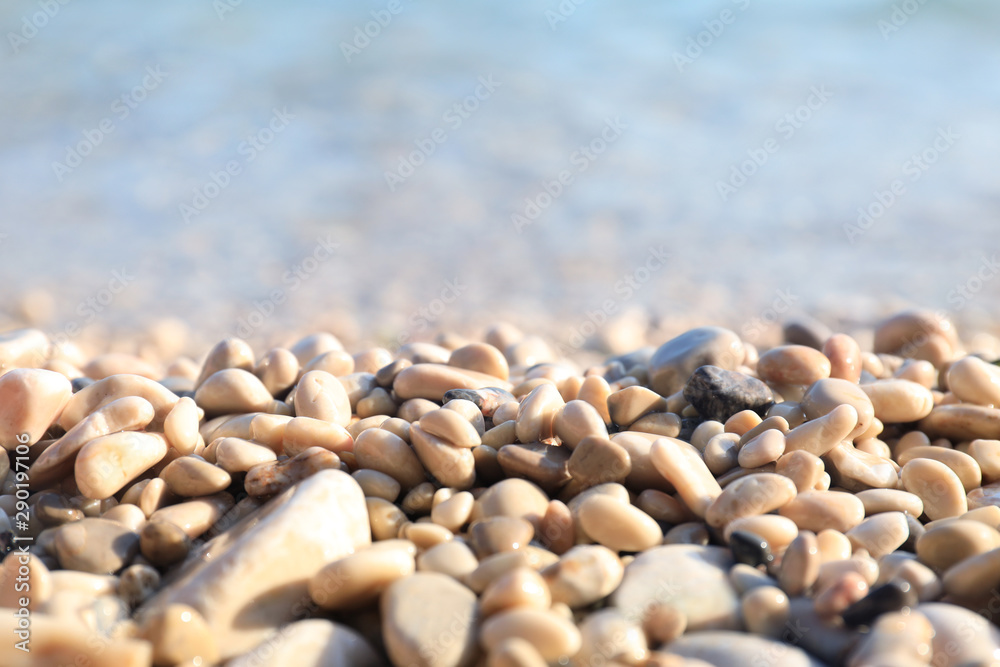 Closeup view of pebble beach on sunny day Closeup view of pebble beach on sunny day