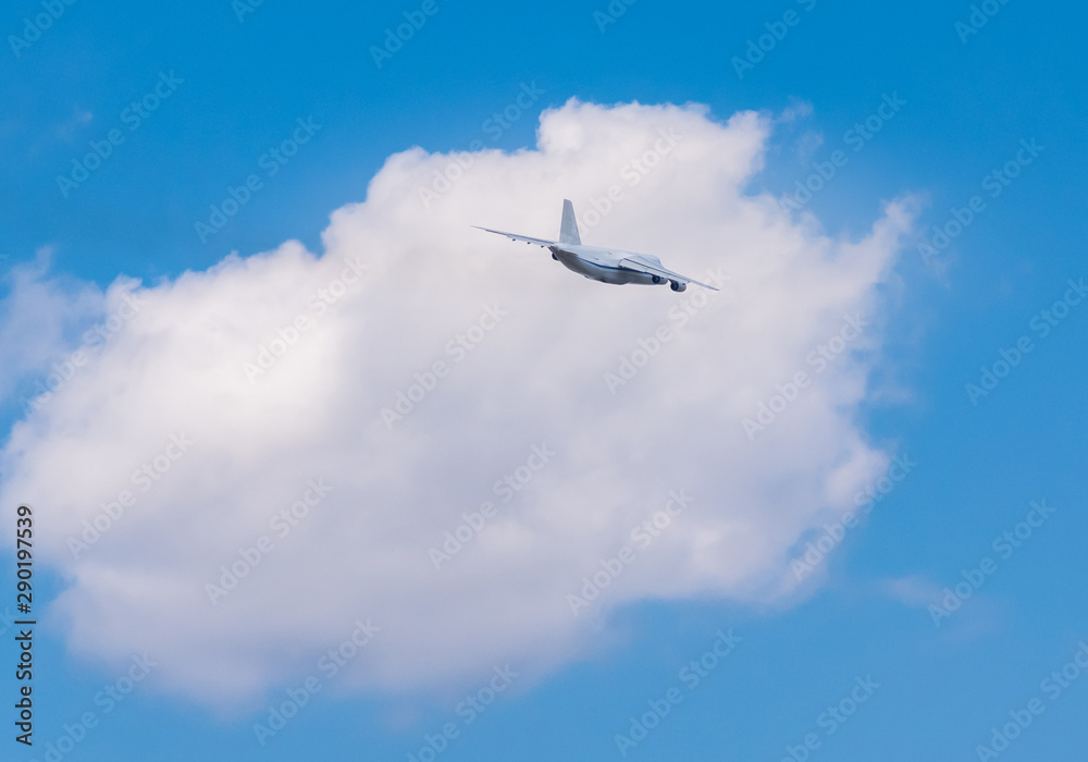 huge cargo transport plane takes off in the sky huge cargo transport plane takes off in the sky