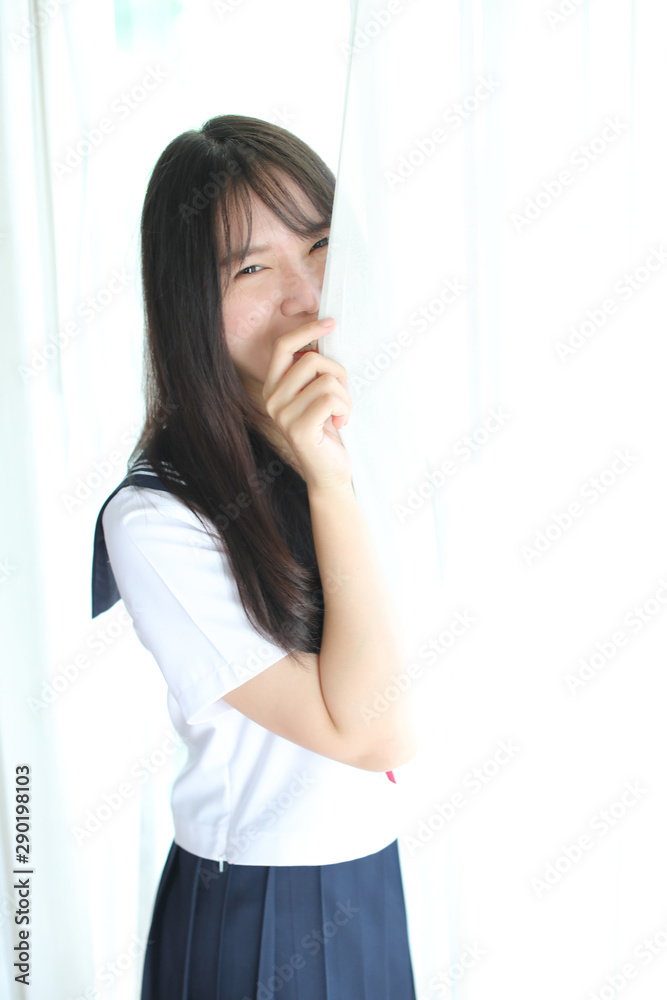 Portrait japanese school girl in white tone bed room Portrait japanese school girl in white tone bed room