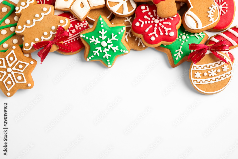 Tasty homemade Christmas cookies on white background, top view