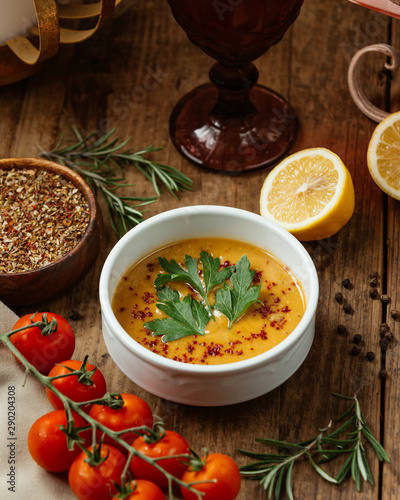 lentil soup with spices vegetables and lemon