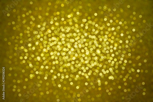 Blurred golden bokeh background from gold crumpled metallic paper. Photo for celebration party or happy new year 2020 and Chinese new year festival.