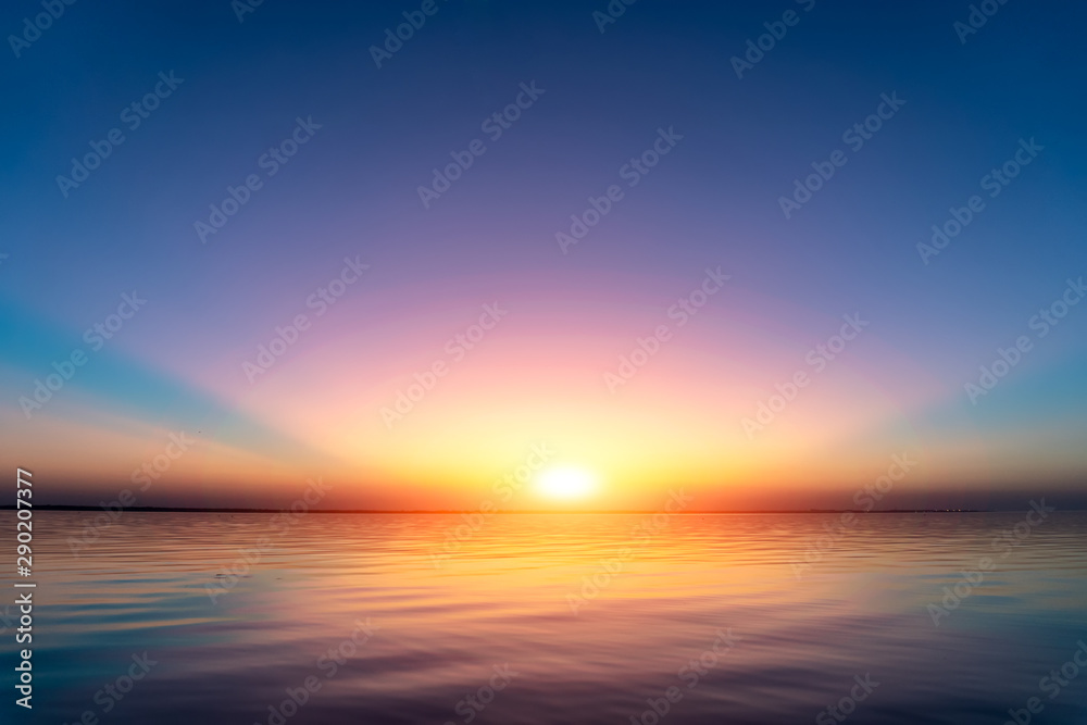 Sunset view above water
