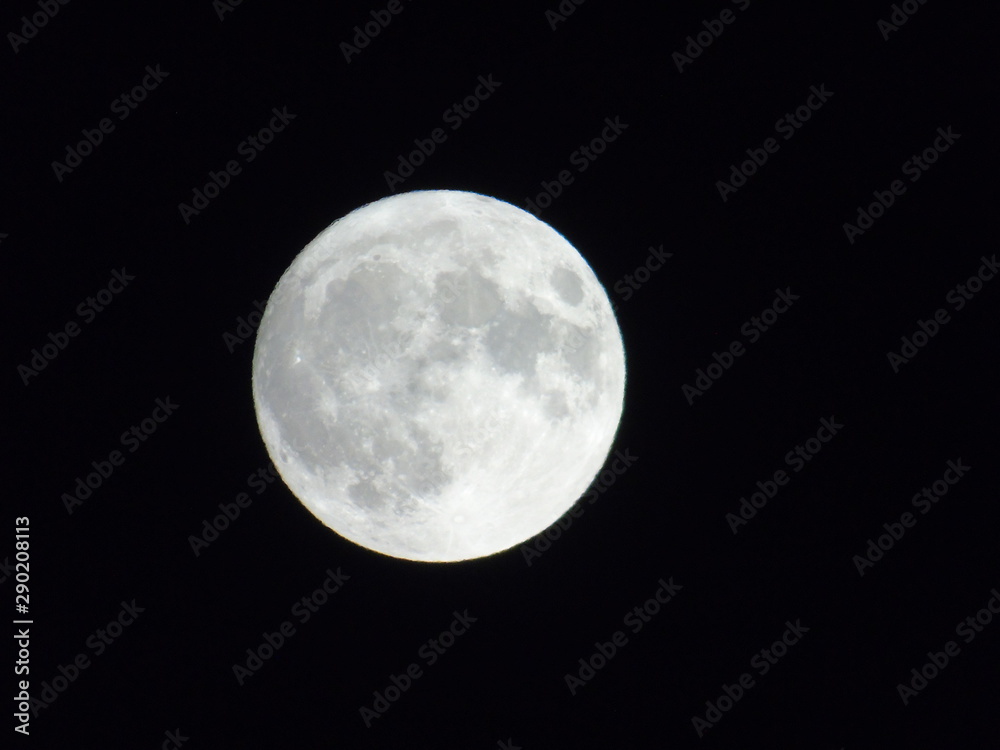 Genova, Italy - 09/13/2019: An amazing photography of the full moon over the city of Genova by night with a great clear sky in background and some stars Genova, Italy - 09/13/2019: An amazing photography of the full moon over the city of Genova by night with a great clear sky in background and some stars