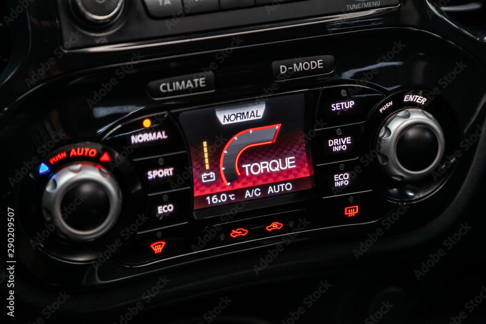 .Modern black car interior: climat control view with air conditioning button, the dashboard with information about temperature inside a car. .Modern black car interior: climat control view with air conditioning button, the dashboard with information about temperature inside a car.