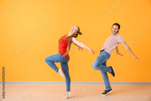 Cool young couple dancing a...