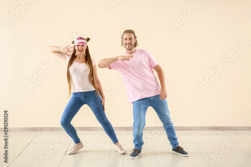 Cool young couple dancing a...