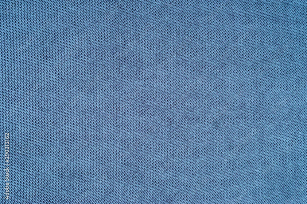 Blue texture of fabric from a textile material. 