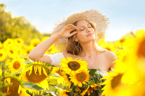 Beautiful young woman in su...