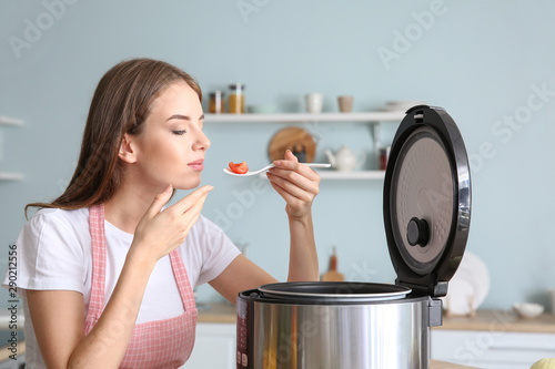 Woman using modern multi co...