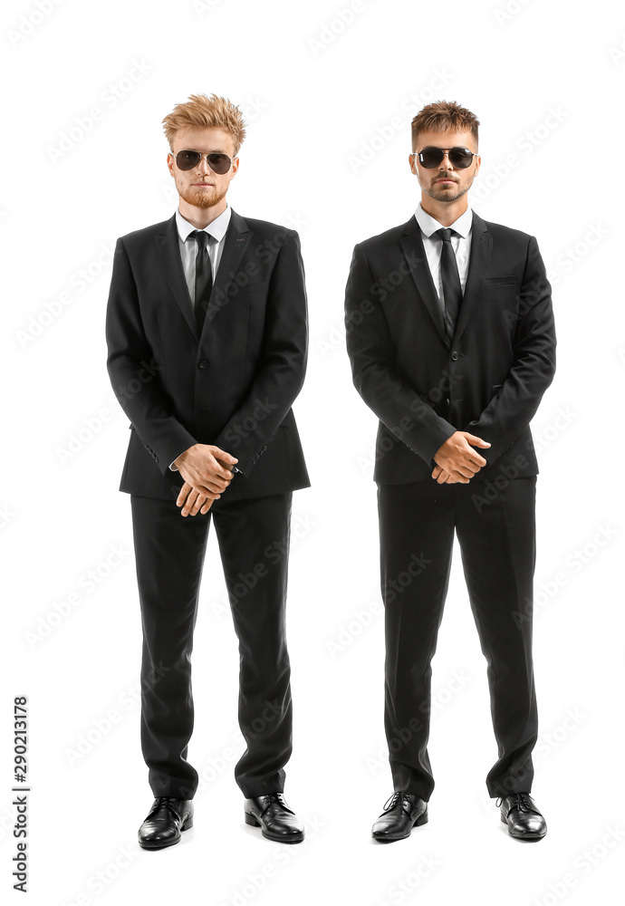 Handsome security guards on white background Handsome security guards on white background