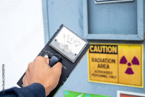 Supervisor use the survey meter to checks the level of radiation in the radioactive zone