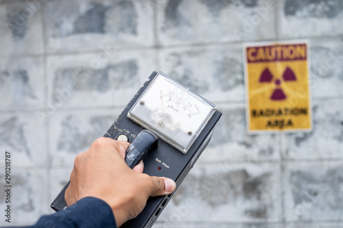 Supervisor use the survey meter to checks the level of radiation in the radioactive zone