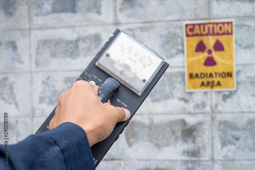 Supervisor use the survey meter to checks the level of radiation in the radioactive zone