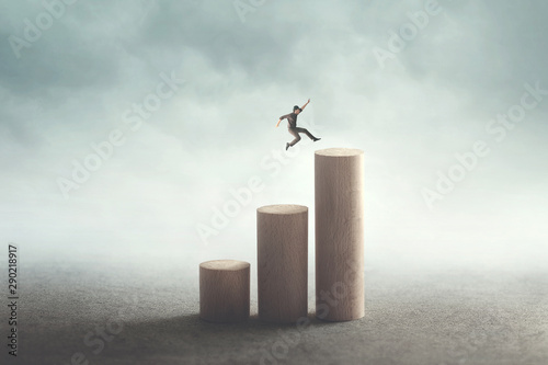 big jump to reach the top, success concept photo
