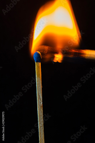 burning matches on a black background