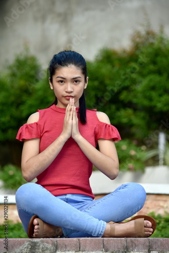 A Teenager Girl And Meditation