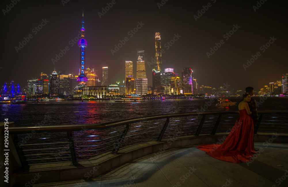 Fototapeta premium A Beautiful night around the Bund area in Shanghai city , this viewpoint offers the best spot for watching the spectacular skyline of this massive city with the most famous shanghai tower.