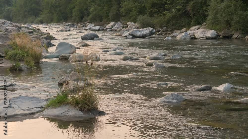 mountain river at sunset in the mountains of italy mountain river at sunset in the mountains of italy